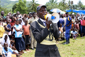“A social mobilization worker calls out to the population of Popokabaka [DRC]. During polio vaccination campaigns, social mobilization workers travel through towns, using a megaphone to inform parents of the importance of vaccination and when their children can be vaccinated.” From the Global Polio Eradication Initiative (http://www.polioeradication.org/Mediaroom/Photos/Photoessays.aspx) Retrieved March 21, 2013.
